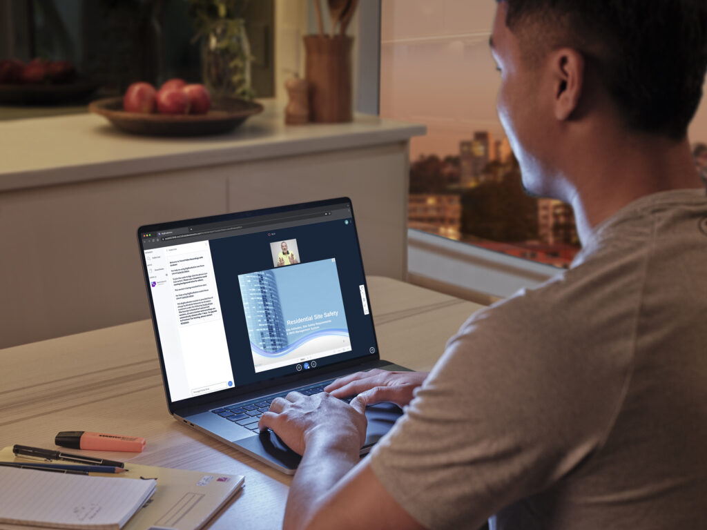 Building student learning from the comfort of home and his laptop computer. Studying the Certificate IV in Building and Construction. Building students make the big switch.