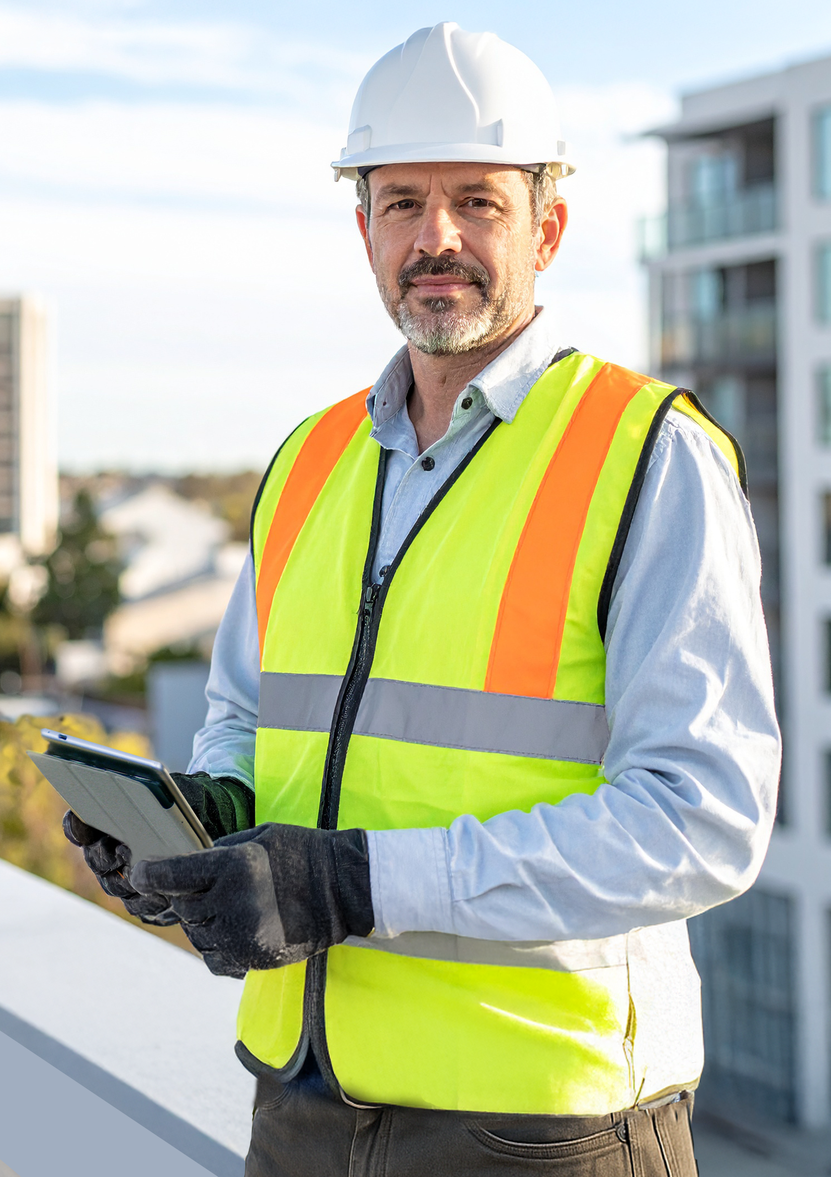 Building Consultant or Waterproofing Engineer on building rooftop conducting inspection.